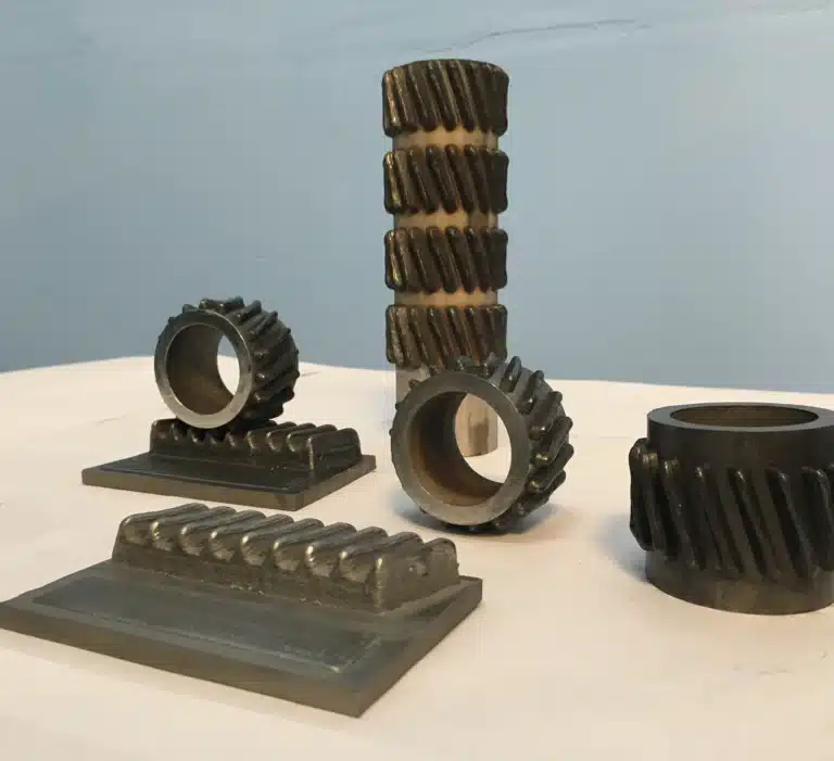 Helical Rack and Pinion. Metal gear and rack parts fabricated using Form Alloy DED system with visible layering and surface texture