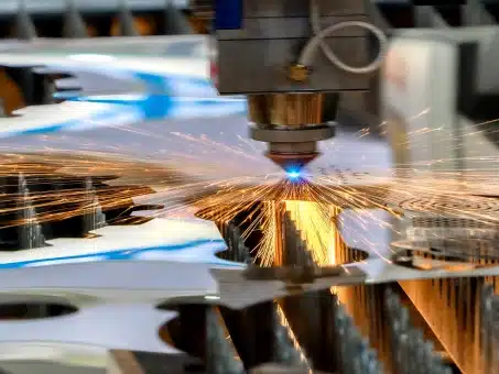 High-speed laser metal printing machine cutting precision parts – advanced additive manufacturing technology at FormAlloy.