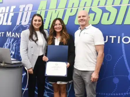 FormAlloy team members present a certificate of achievement at the Application Development Center’s first anniversary, celebrating innovation in Directed Energy Deposition technology.